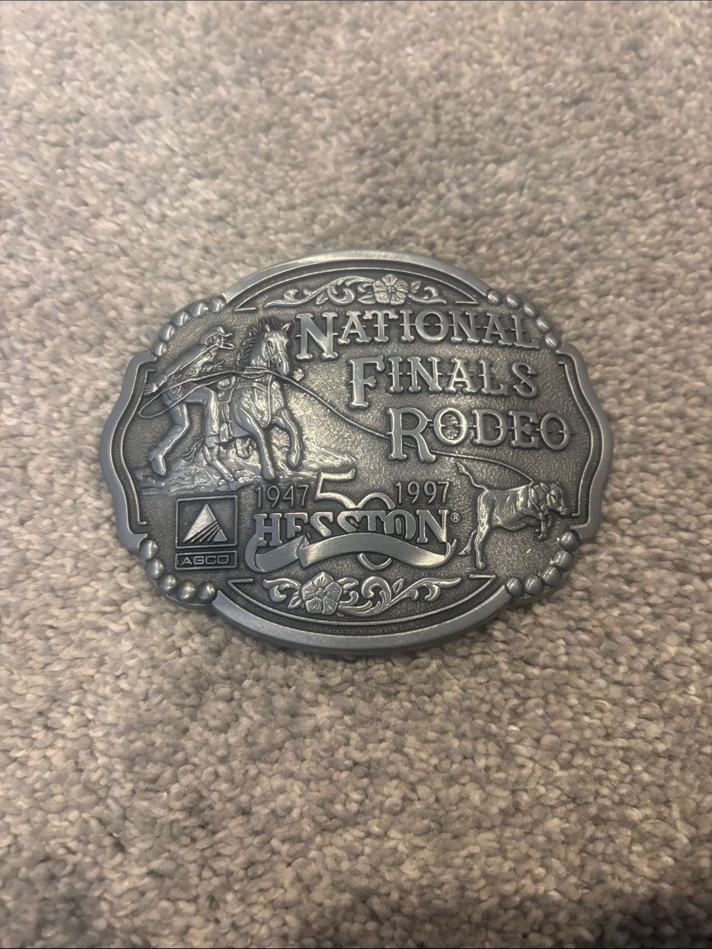 Vintage 50th anniversary Hesston National Finals Rodeo belt buckle.
